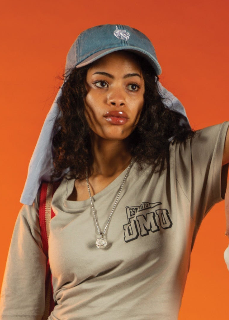 A DSU x DMU Fashion Project. Work Produced by Esther Lee showing DMU Official Merchandise in Context.